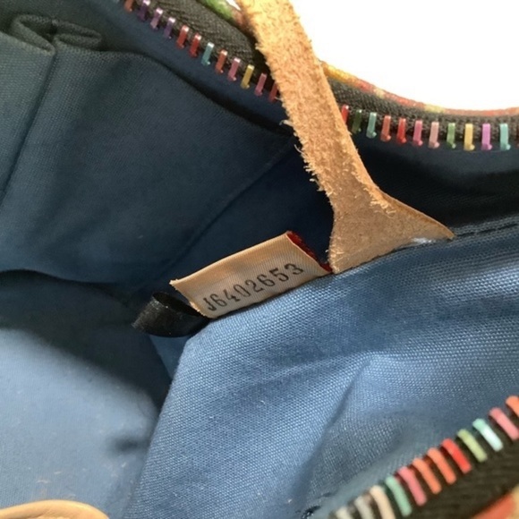 Authentic Dooney and Bourke bag. - Picture 6 of 12